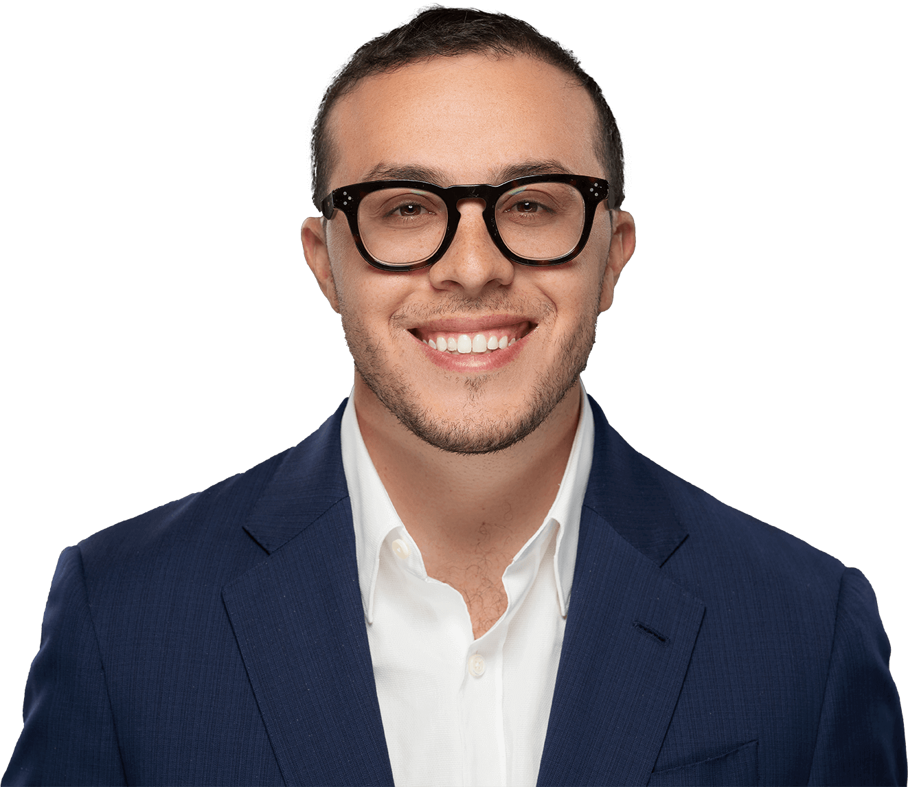 A person wearing glasses and a blue suit smiles at the camera against a plain background, exuding the confident charm typical of an Akel Homes professional.