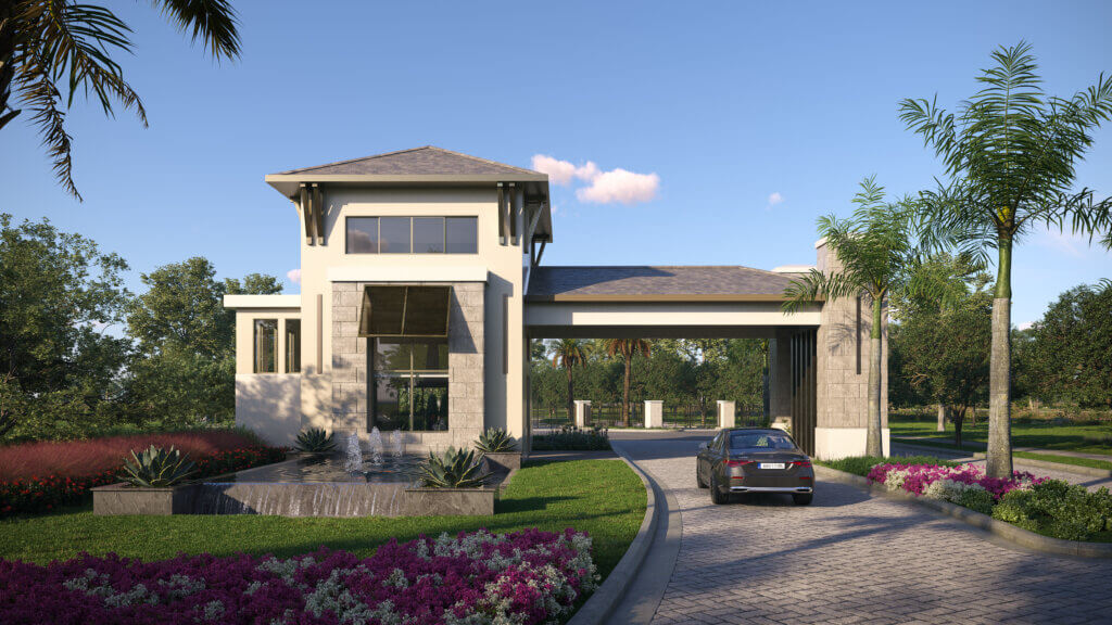 A modern, two-story entrance gate with a stone facade and large windows stands at the end of a curved, paved driveway. A car is parked on the right. The landscape includes palm trees, shrubs, and flower beds under a clear blue sky.